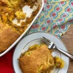 Jiffy cornbread tamale pie on a white plate with a fork