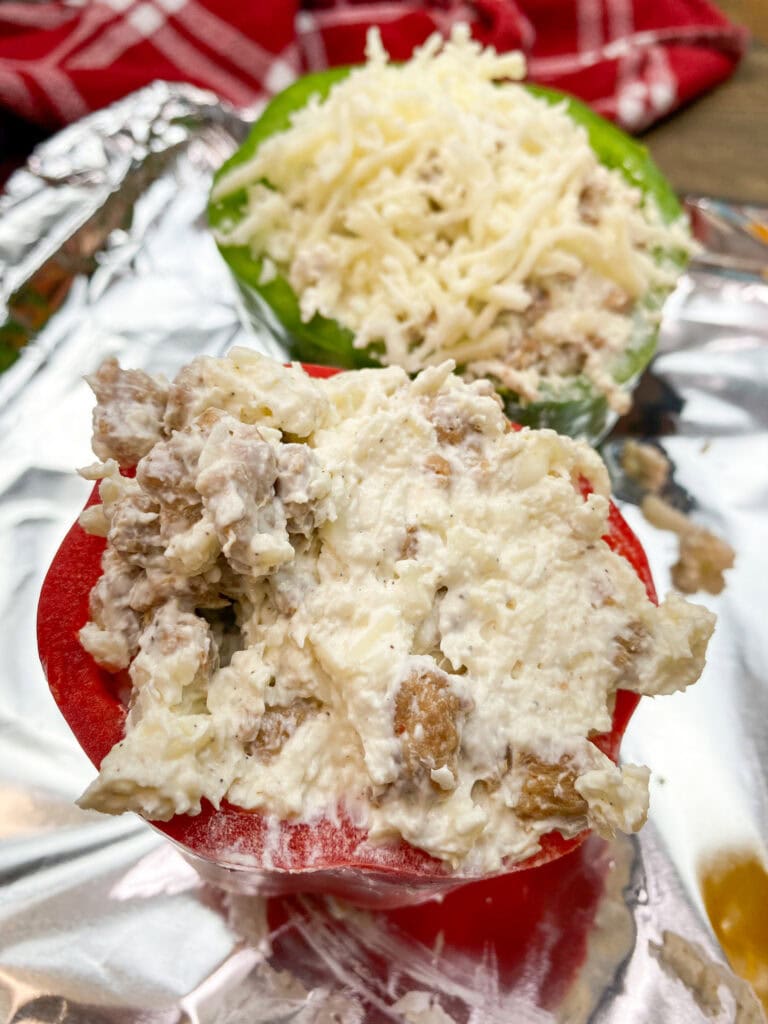 Stuffed bell peppers with sausage, cheese, mayo, and sour cream. 