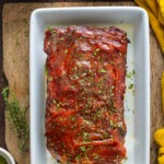 Meatloaf on a white plate.