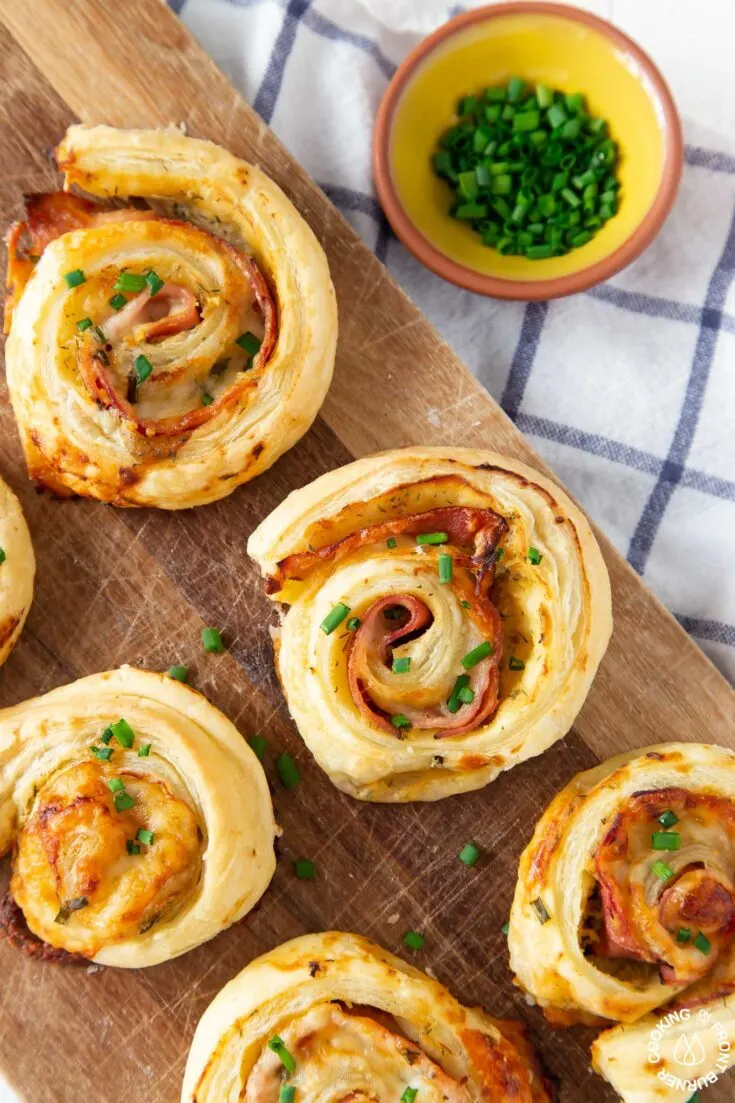 https://www.backtomysouthernroots.com/wp-content/uploads/2021/08/Ham-and-Cheese-Puff-Pastry-Appetizer-735x1103.jpg.webp