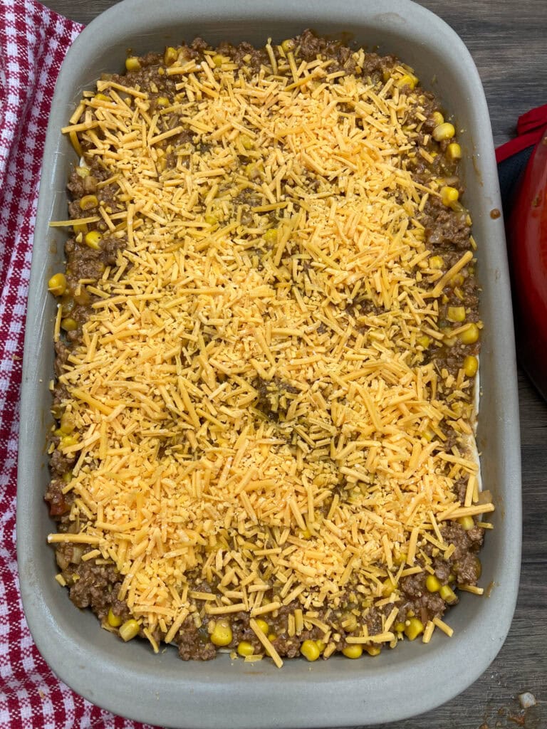 Layering the casserole in a baking dish.