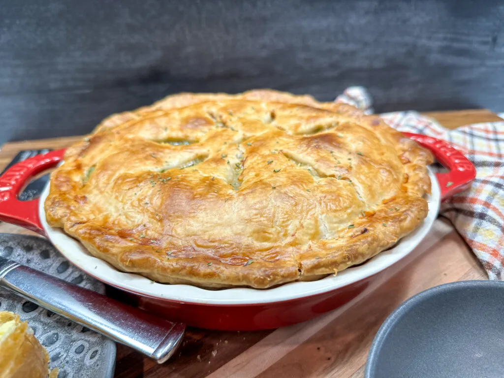 https://www.backtomysouthernroots.com/wp-content/uploads/2023/01/chicken-pot-pie-cooked-3-1024x768.jpg.webp