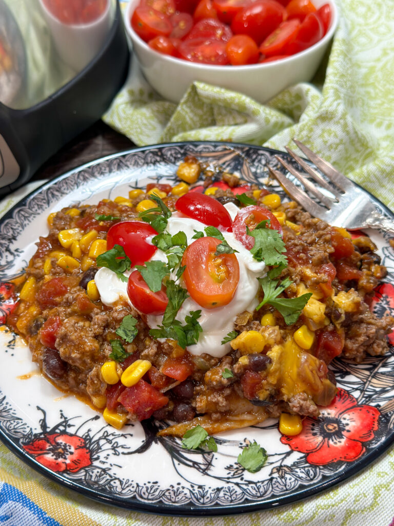 https://www.backtomysouthernroots.com/wp-content/uploads/2023/04/slow-cooker-Mexican-ground-beef-casserole-2-768x1024.jpg