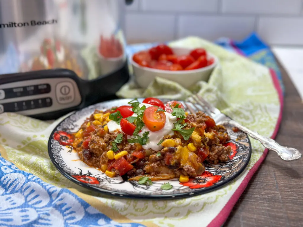 https://www.backtomysouthernroots.com/wp-content/uploads/2023/04/slow-cooker-Mexican-ground-beef-casserole-4-1024x768.jpg.webp