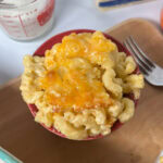 Copycat Chick-Fil-A mac and cheese in a red dish.