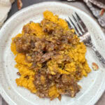 Sweet potato casserole on a plate.